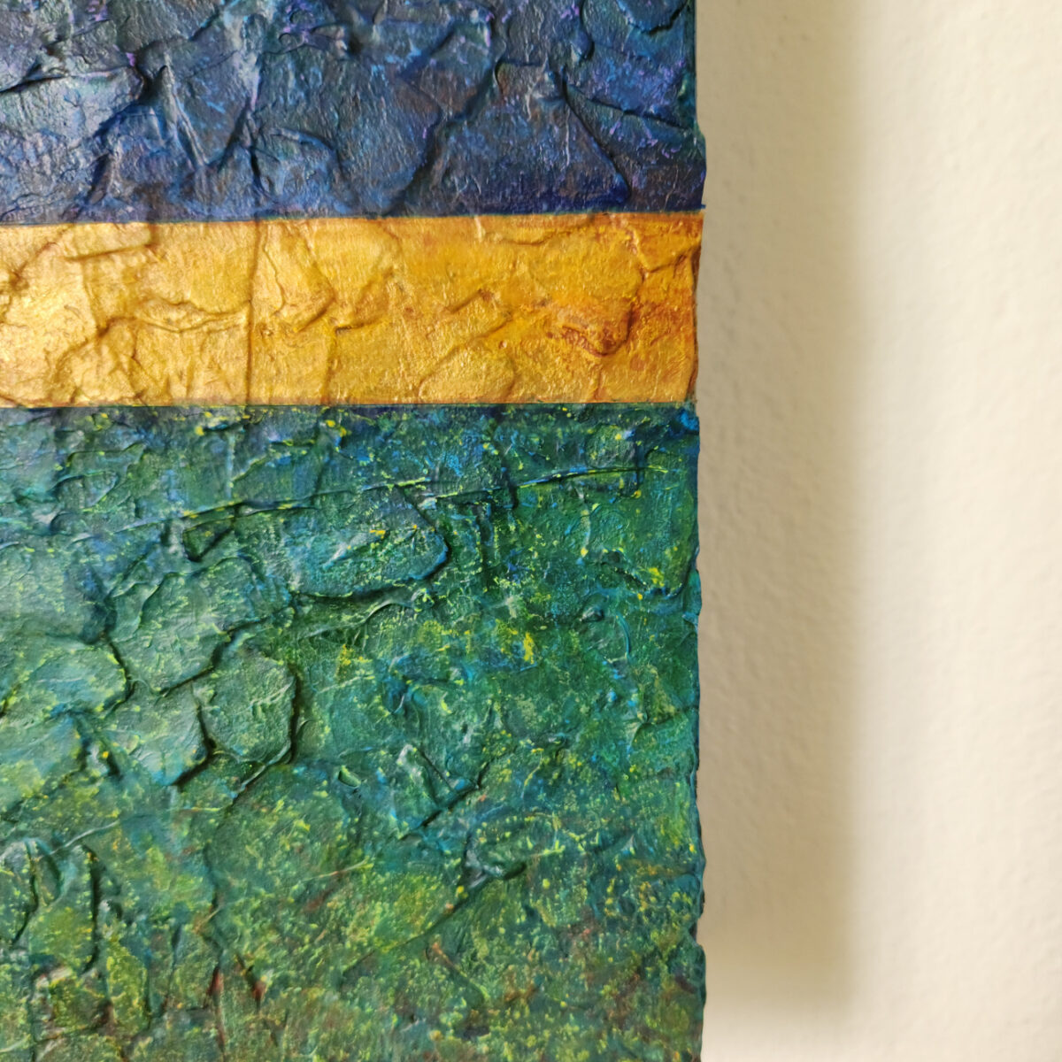 Mixed Media Art. Green, blue, and gold textured art.