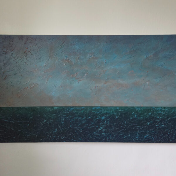 Abstract landscape of blue and pink sky with green ocean water